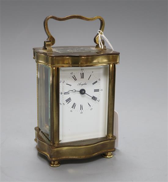 A gilt brass carriage timepiece with white enamelled Roman dial, retailed by Angelus H.11.5cm